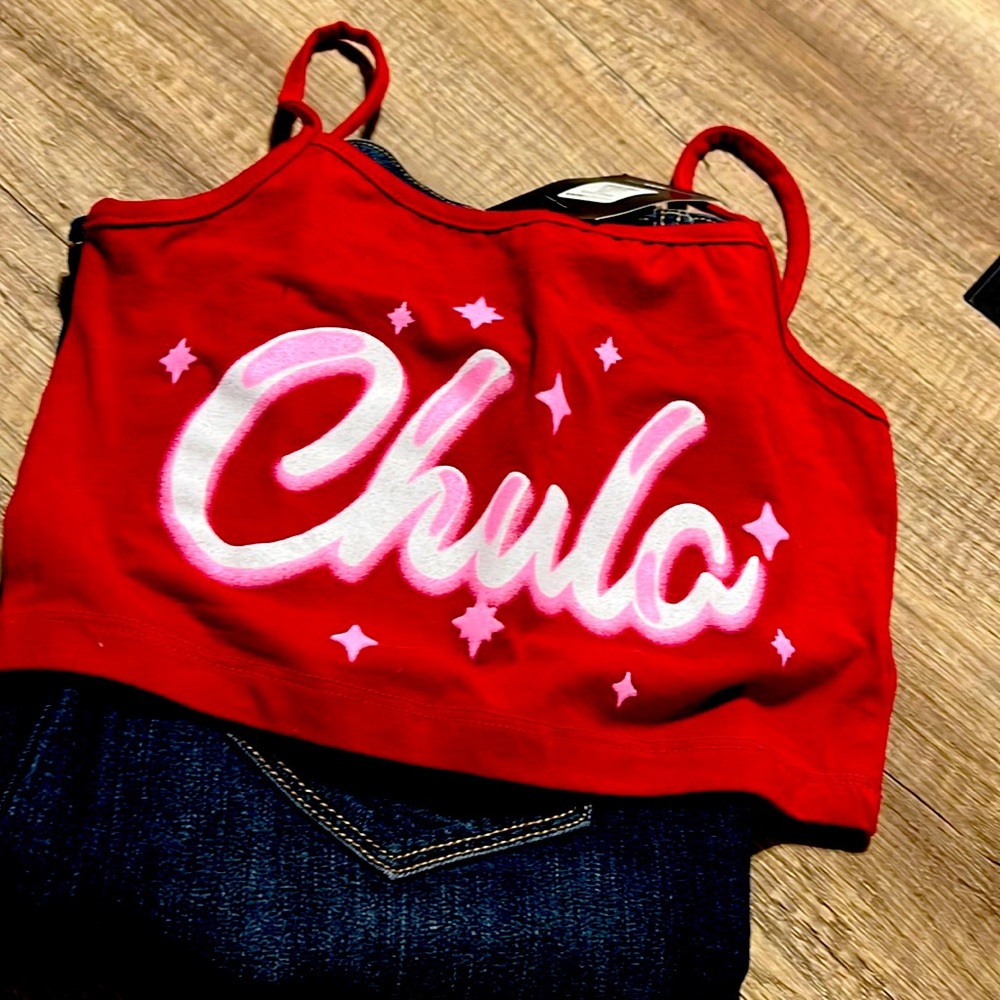 Small red graphic tank from fashion nova with the word CHULA across